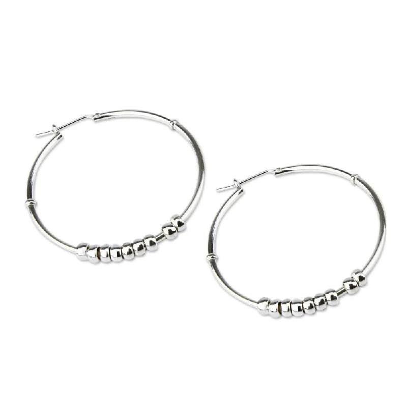 trendy gold earrings with crystals for weddings -Handmade Sterling Silver 'Spellbound' Hoop Earrings (Peru)